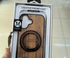 Coque MOVENCHY Fanshi Series en bois avec anneau rotatif.